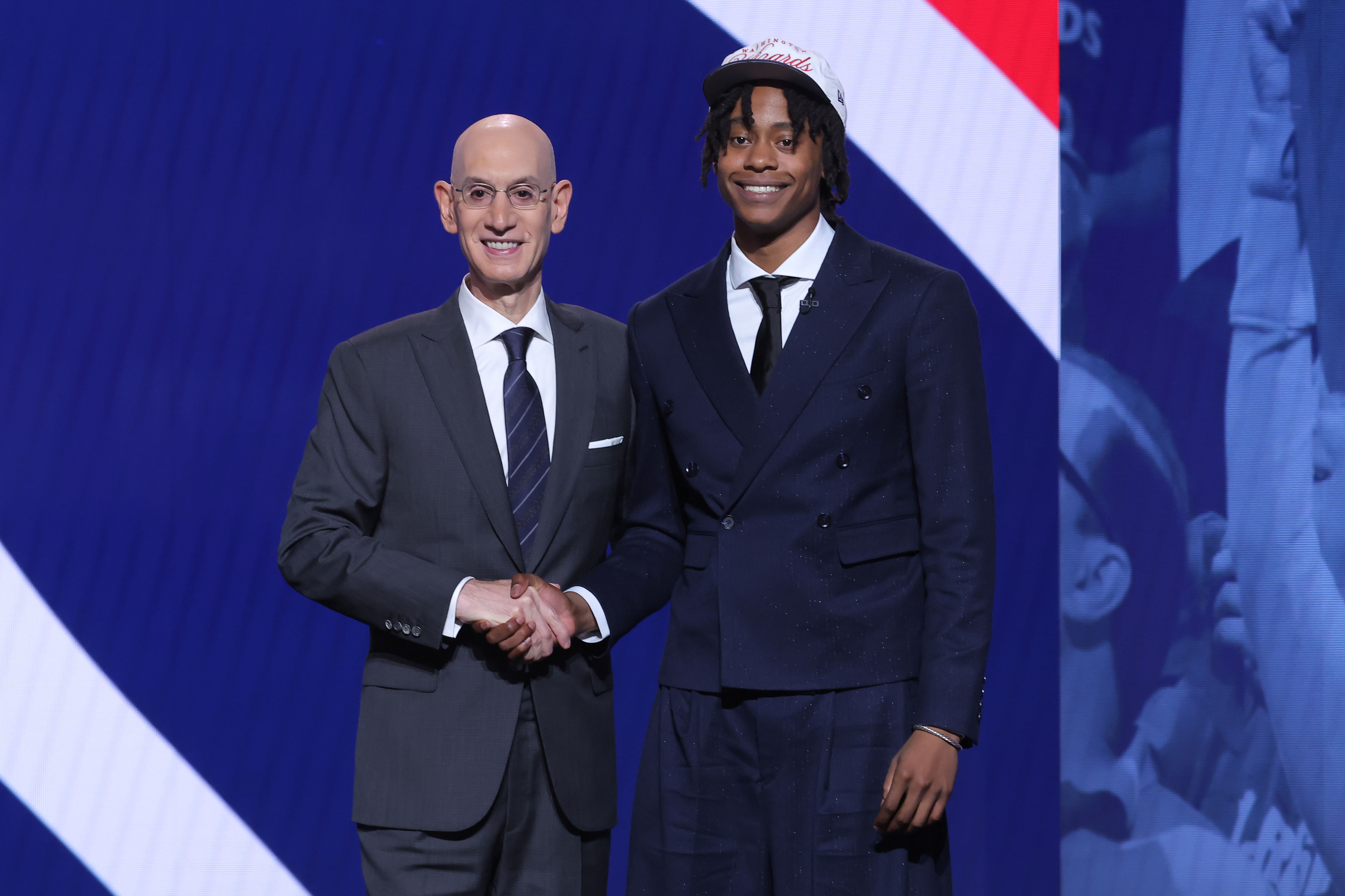 Tre Johnson stands with NBA commissioner Adam Silver after being selected as the sixth pick by the Washington Wizards in the first round of the 2025 NBA Draft at Barclays Center. Photo: Imagn